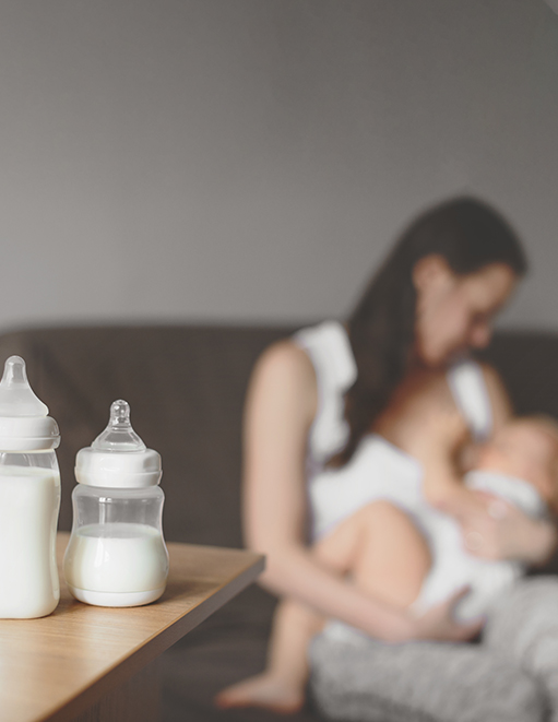 Mom Breast feeding and baby bottles